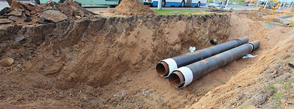 water lines laying in the dirt